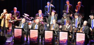 Jazz orchestra on stage with a singer