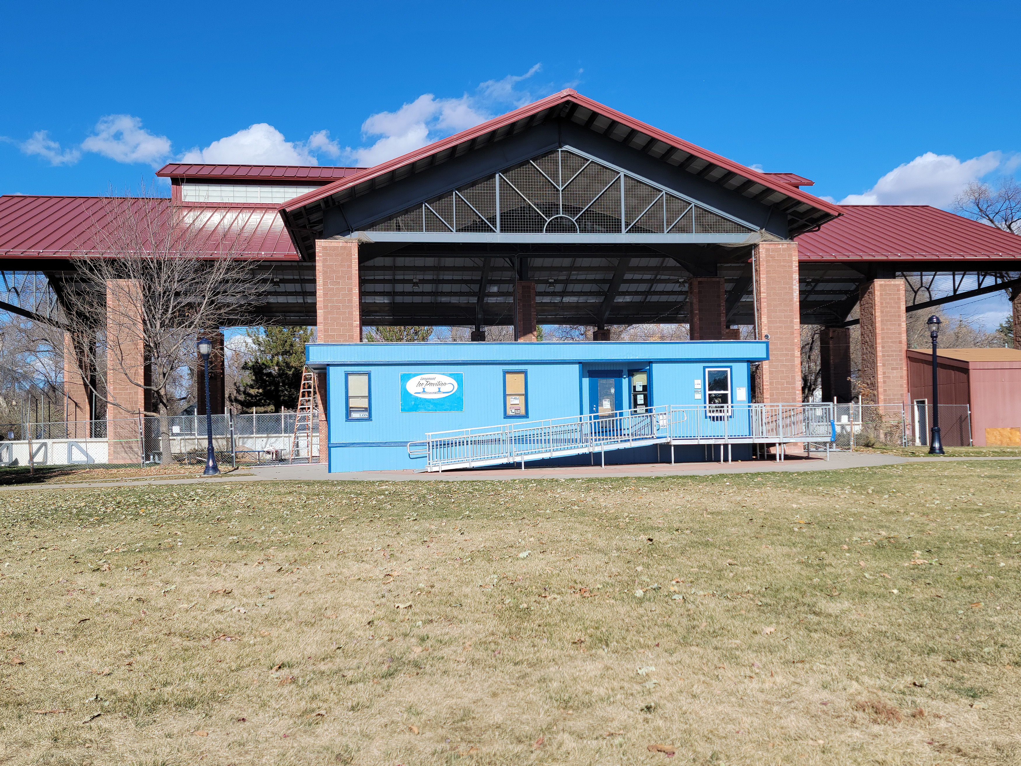 Blue trailer in front of Longmont Ice Pavilion