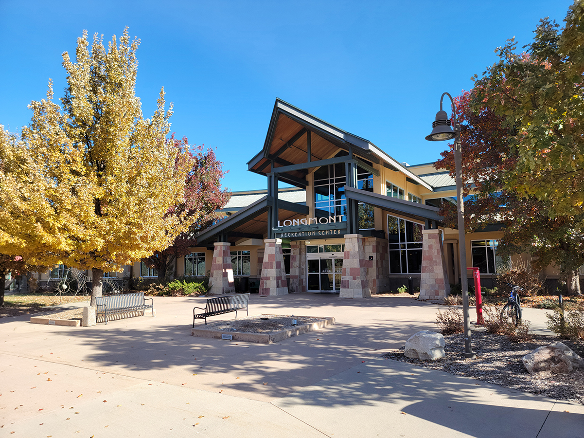 The entrance of the Longmont Recreation Center in fall.