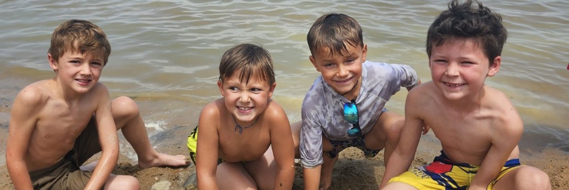 Four boys at Union swim beach.